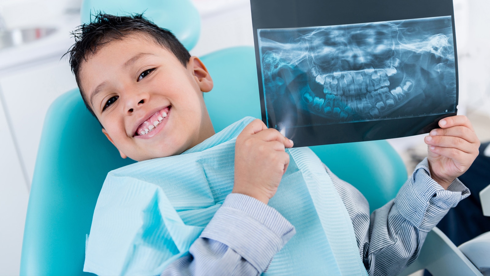 Child with an X-ray Photo