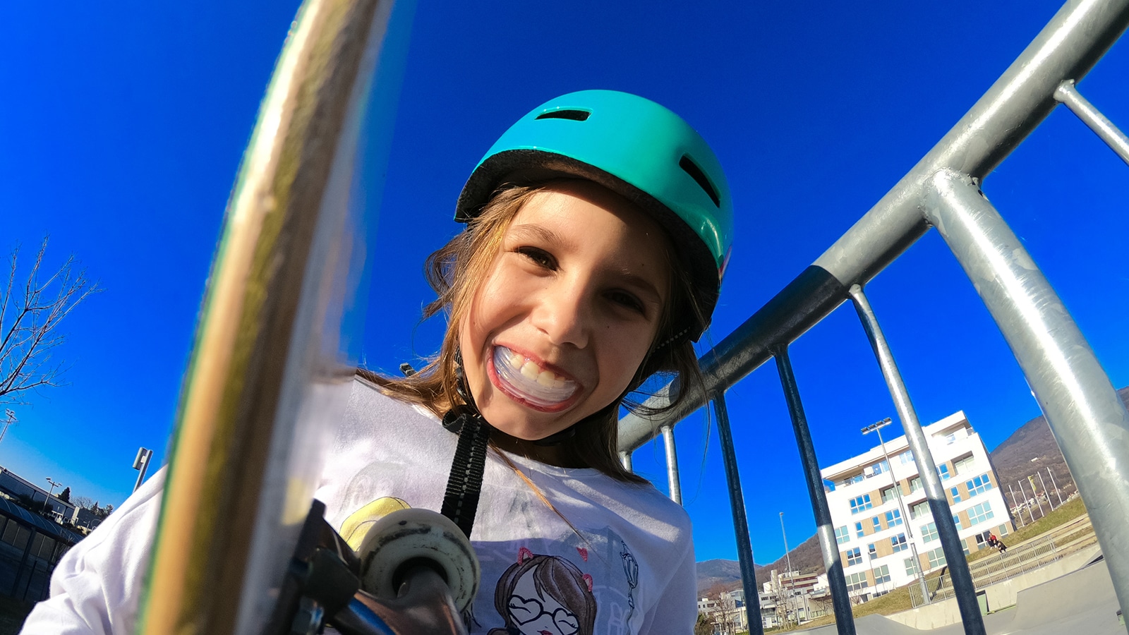 Child Smiling with Mouthguard